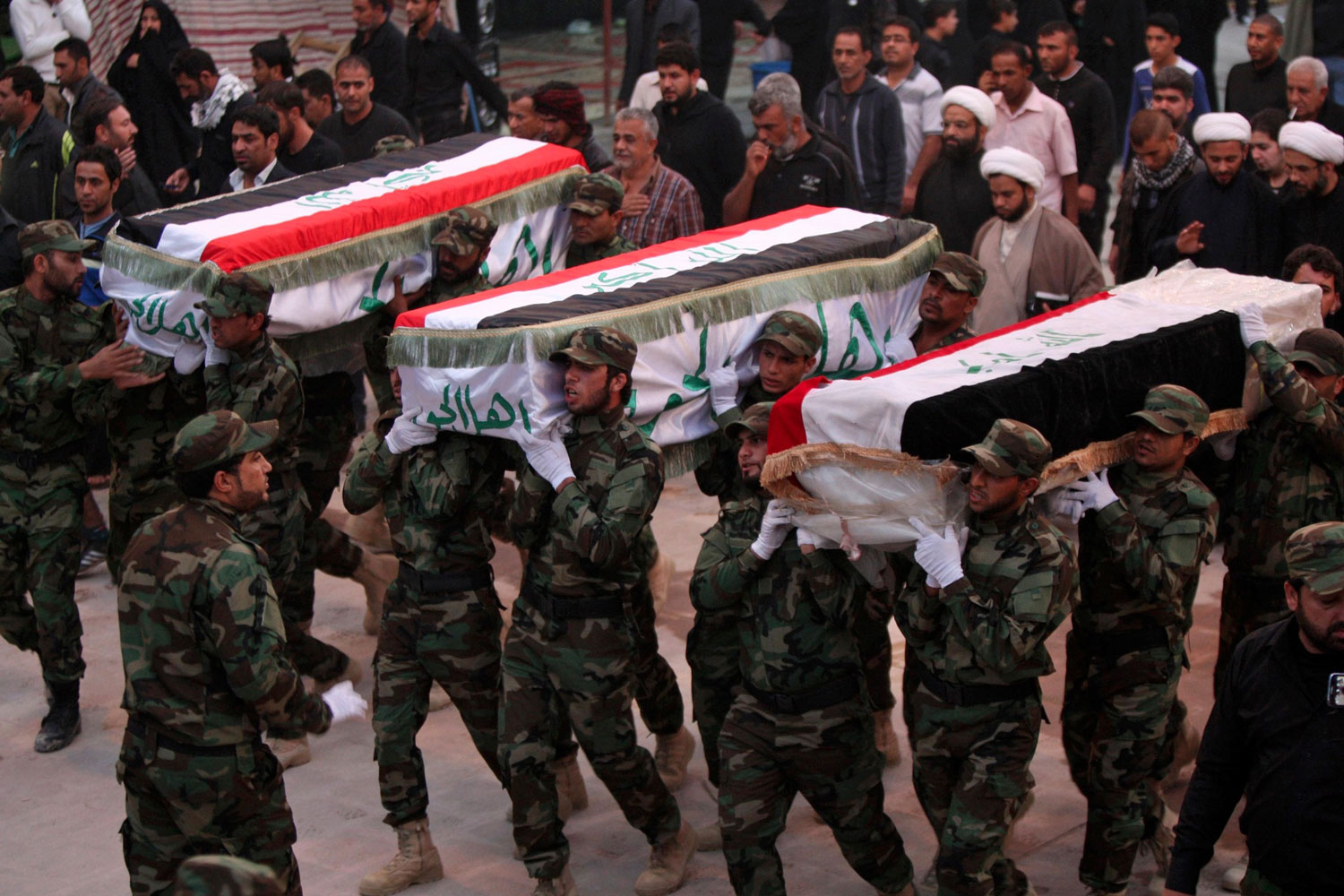 Funeral por los miembros del grupo chií Asaib Ahl al-Haq en Damasco