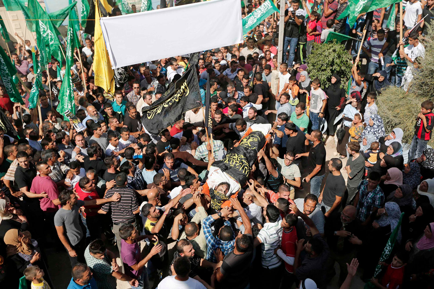 Hamas y la Jihad Islámica pugnan por mayor protagonismo en el funeral por Assi