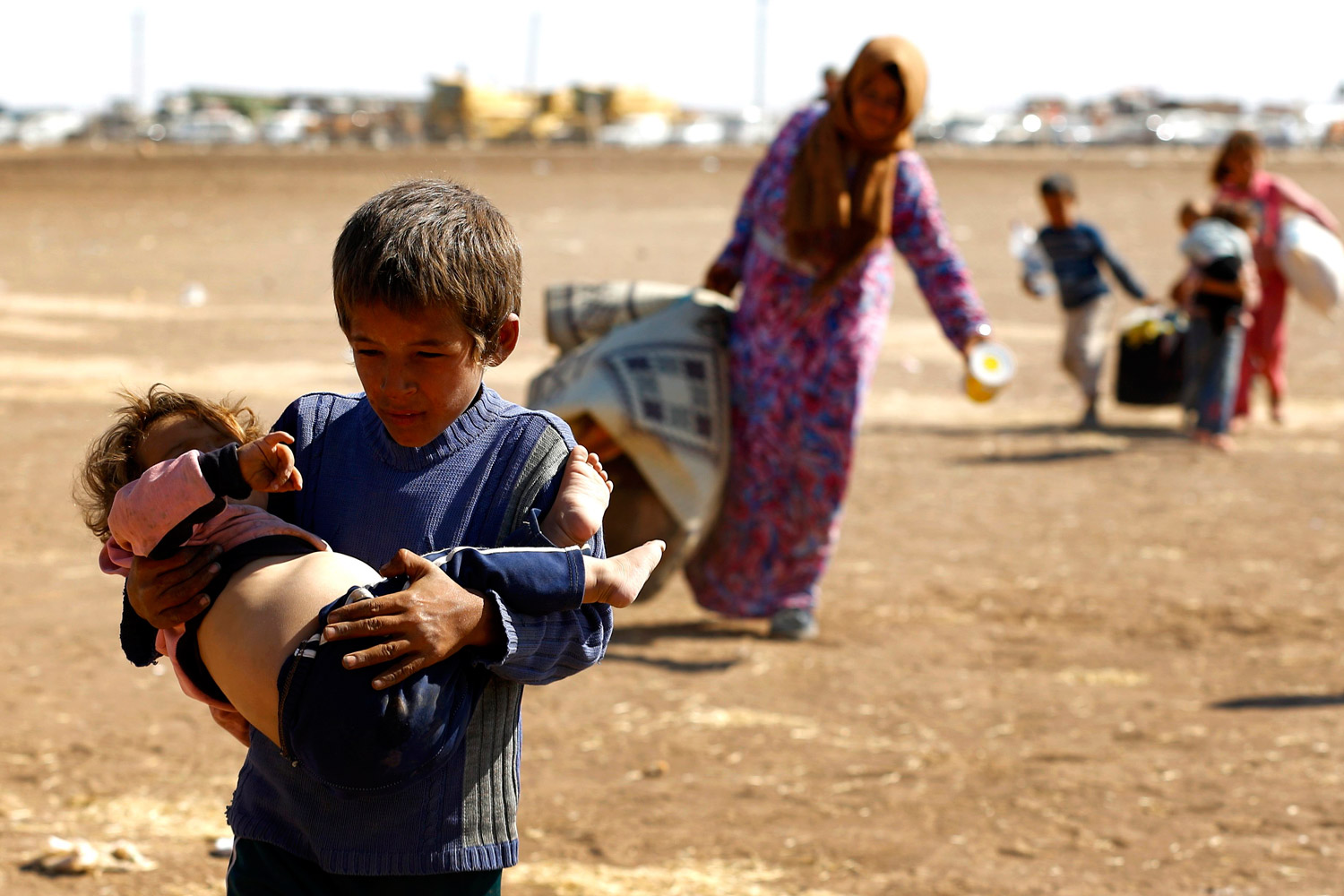 El Estado Islámico provoca un drama humanitario. 200.000 refugiados kurdos escapan de Siria