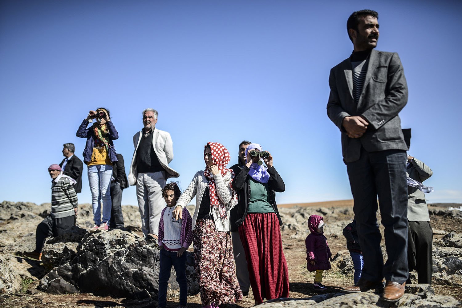 Kurdos defienden Kobani con armas lanzadas desde el aire por aviones de Estados Uniidos