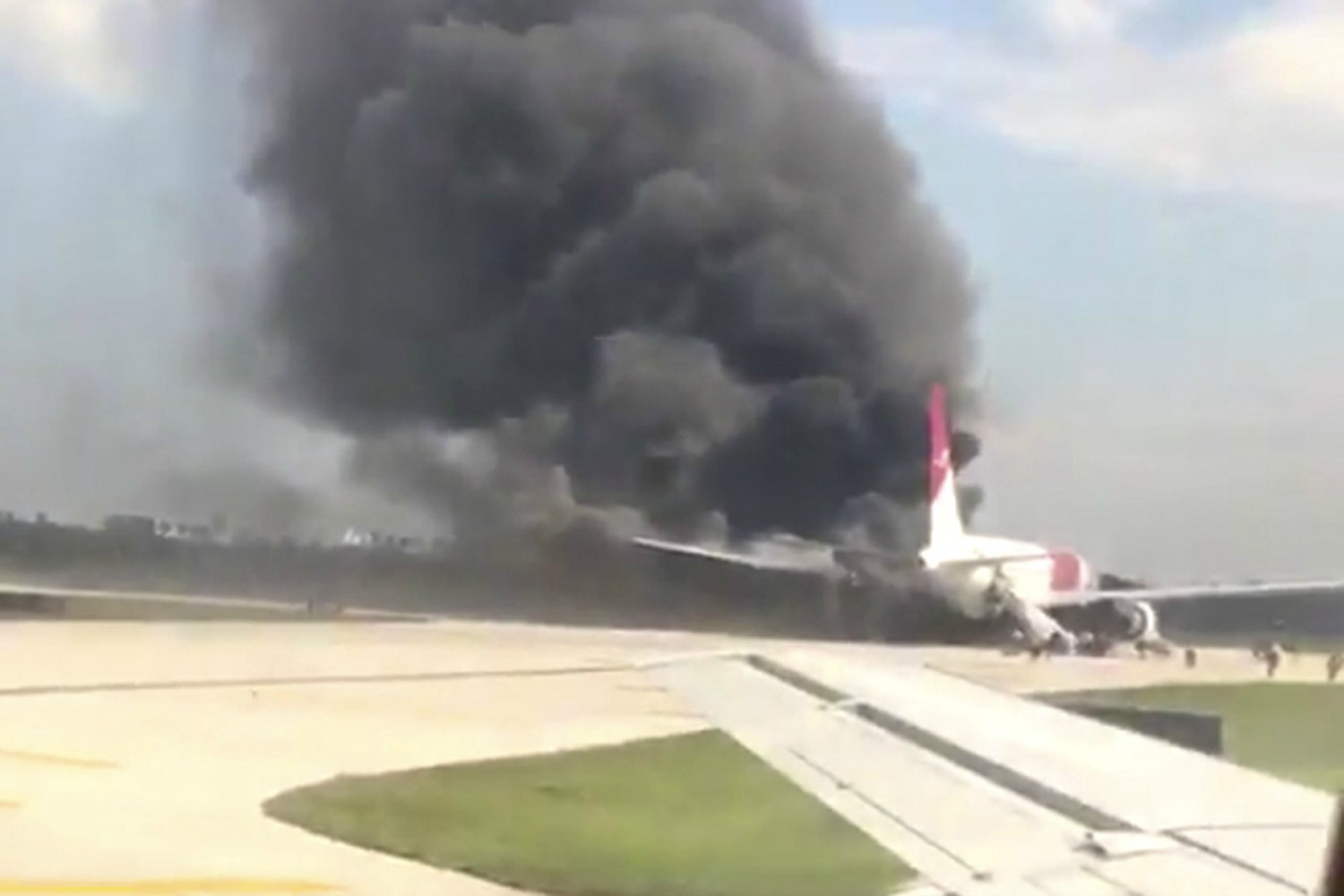 7 hurt after airplane traveling from Florida to Venezuela catches fire