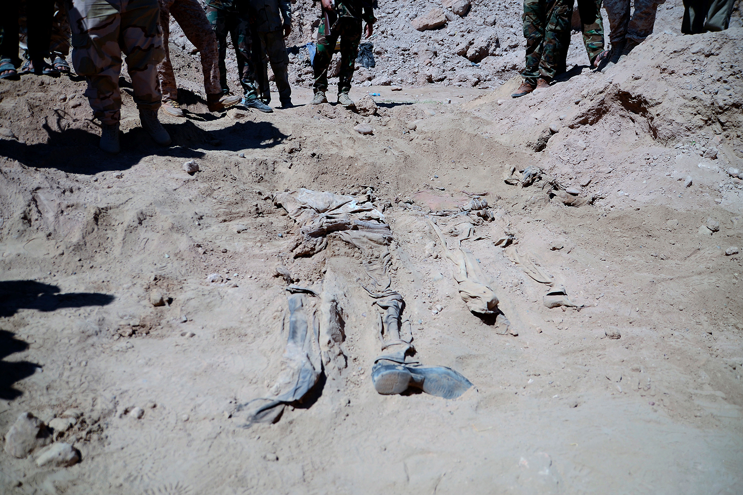 Two mass graves reveal the atrocities of the Islamic State