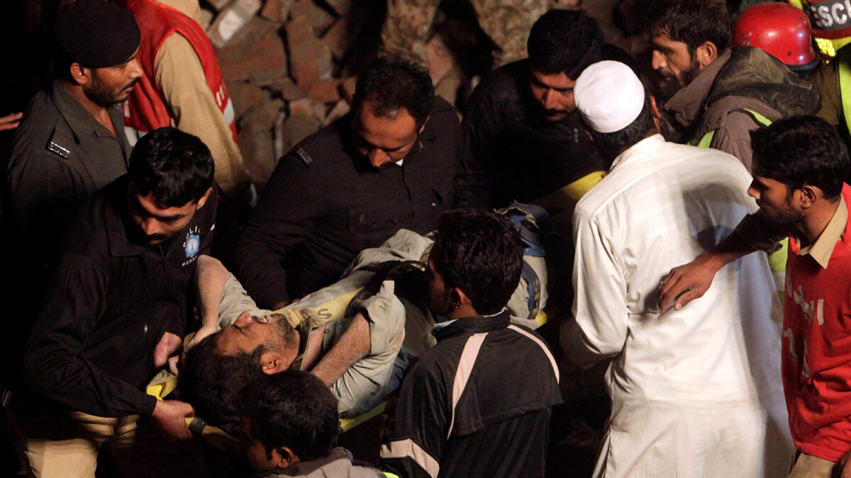 18 dead and over 100 missing in Pakistan factory collapse