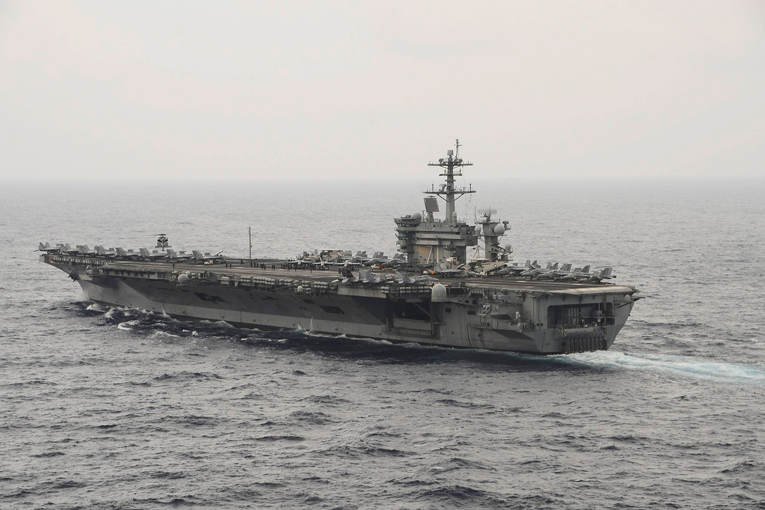 Ashton Carter visits aircraft carrier in South China Sea during rising tension