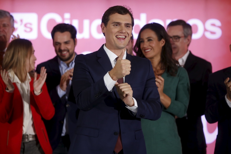 Ciudadanos party leader Albert Rivera (C) reacts with party members after results were announced in Spain's general election in Madrid, Spain, December 20, 2015. REUTERS/Susana Vera