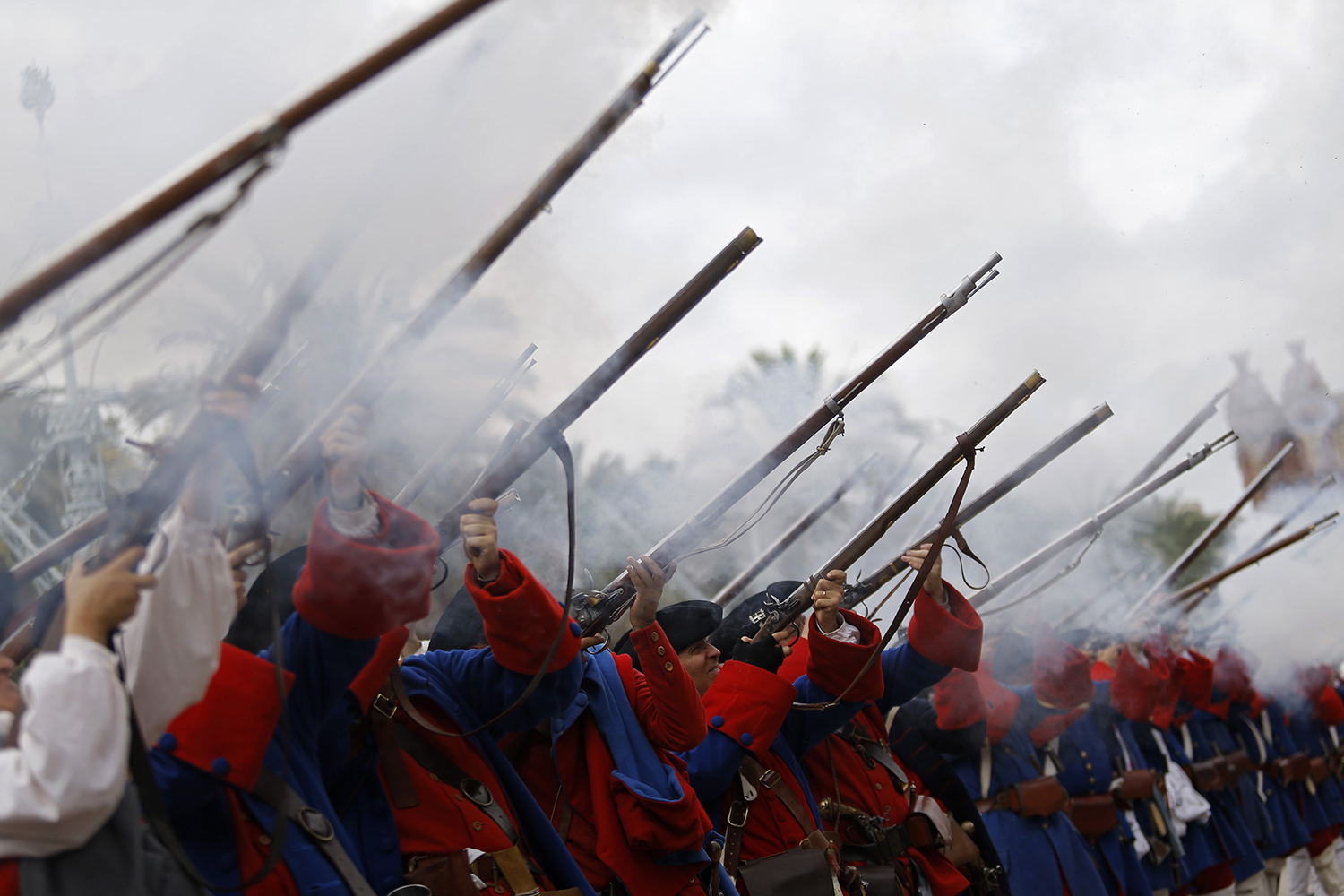Men dressed as Catalan soldiers from 1714 perform during a rally calling for the independence of Catalonia, in Barcelona, Spain, Friday, Sept. 11, 2015. Advocates of independence for Spain's northeastern region of Catalonia on Friday launched their campaign to try to elect a majority of secessionists in regional parliamentary elections on Sept. 27. (AP Photo/Francisco Seco)