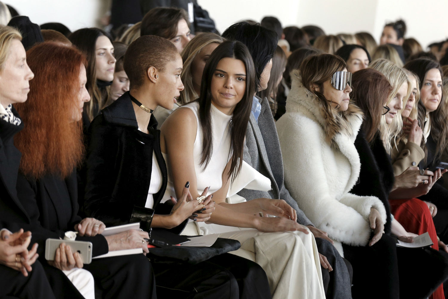 Models Adwoa Aboah (3rd-L) and Kendall Jenner (C) attend the Calvin Klein Fall/Winter 2016 collection during New York Fashion Week in New York, February 18, 2016. REUTERS/Brendan McDermid