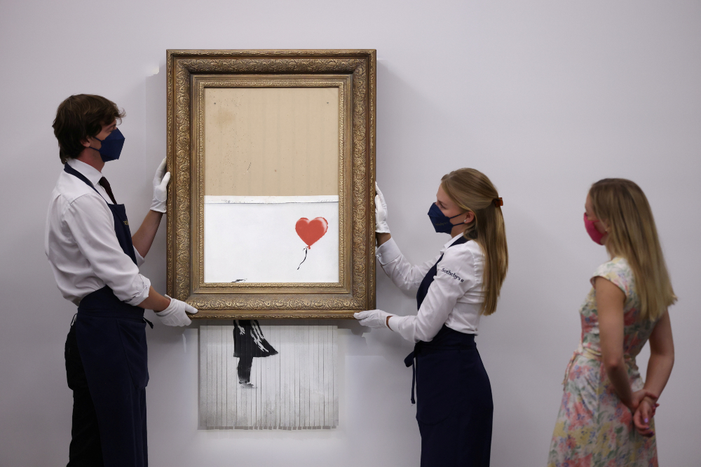 Nuevo récord para Banksy: vendido su cuadro «Niña con globo» por 21,8 millones de euros
