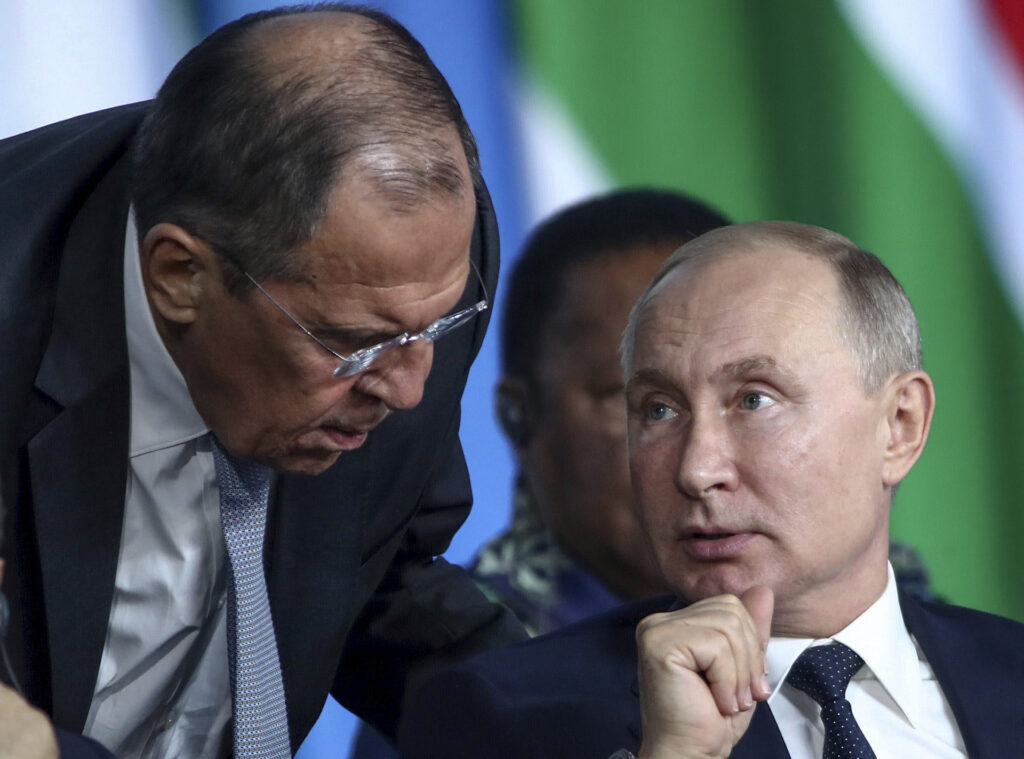 Sergey Lavrov y Vladimir Putin