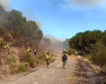 Un centenar de efectivos trabajarán esta noche para extinguir el incendio en El Ronquillo (Sevilla)