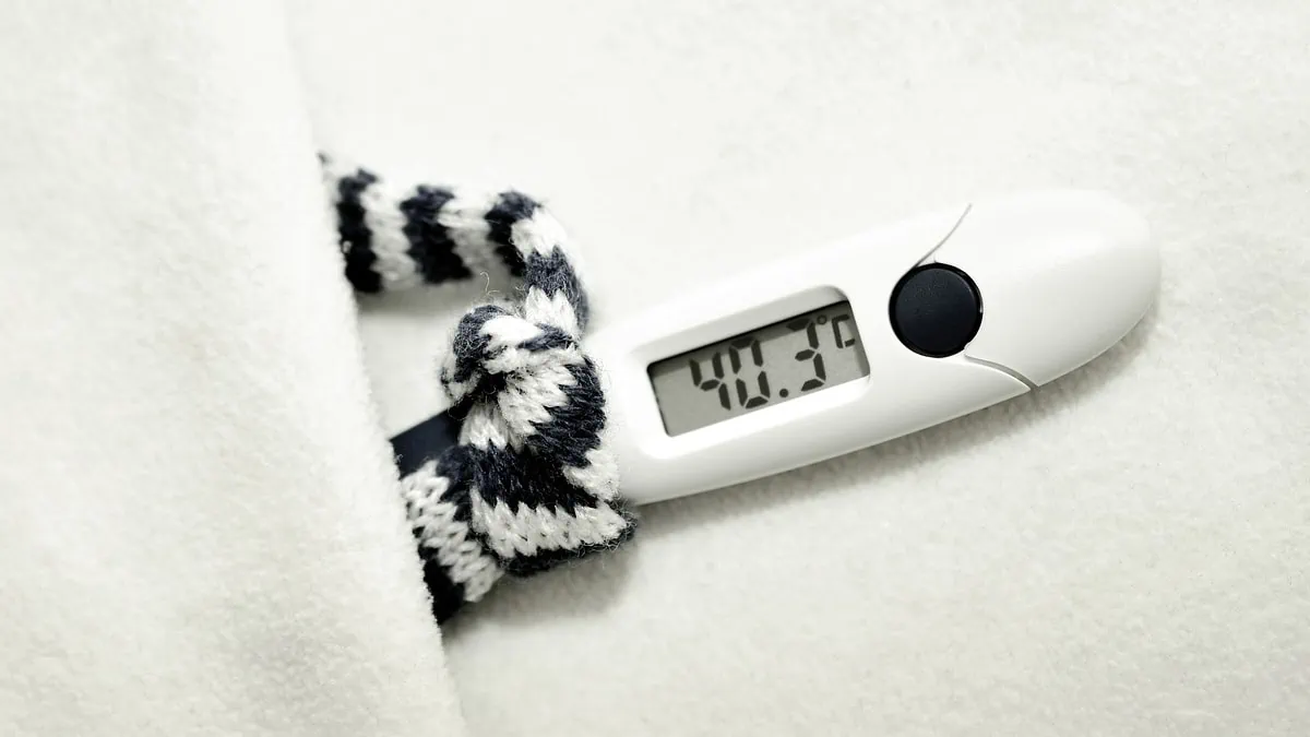 Thermometer shows fever, which is a symptom of influenza, one of the most common diseases in winter