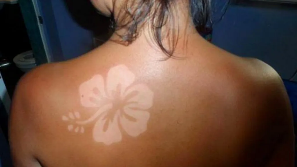 Tatuaje solar con forma de flor. (Fuente: Pinterest)