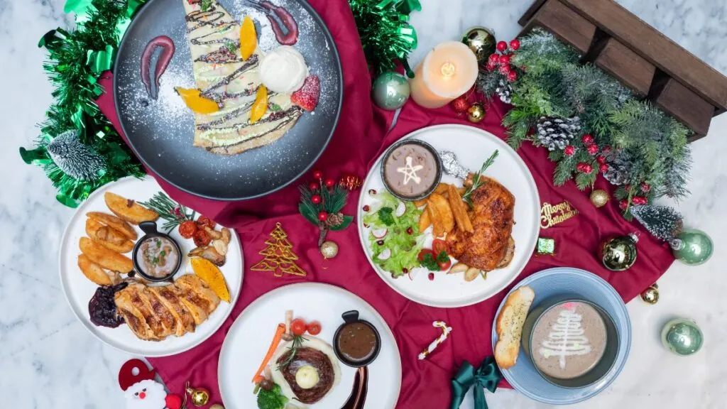 Mesa con platos de un menú de Nochevieja: (Canva)