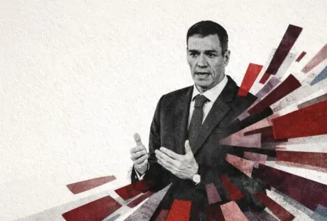 A la izquierda del padre Sánchez